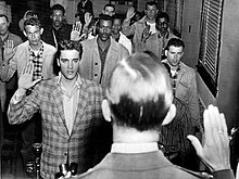 220px-Elvis_sworn_into_army_1958.jpg